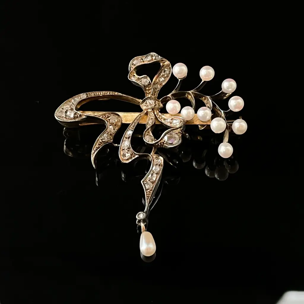 Broche diamants & perles