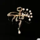 Broche diamants & perles