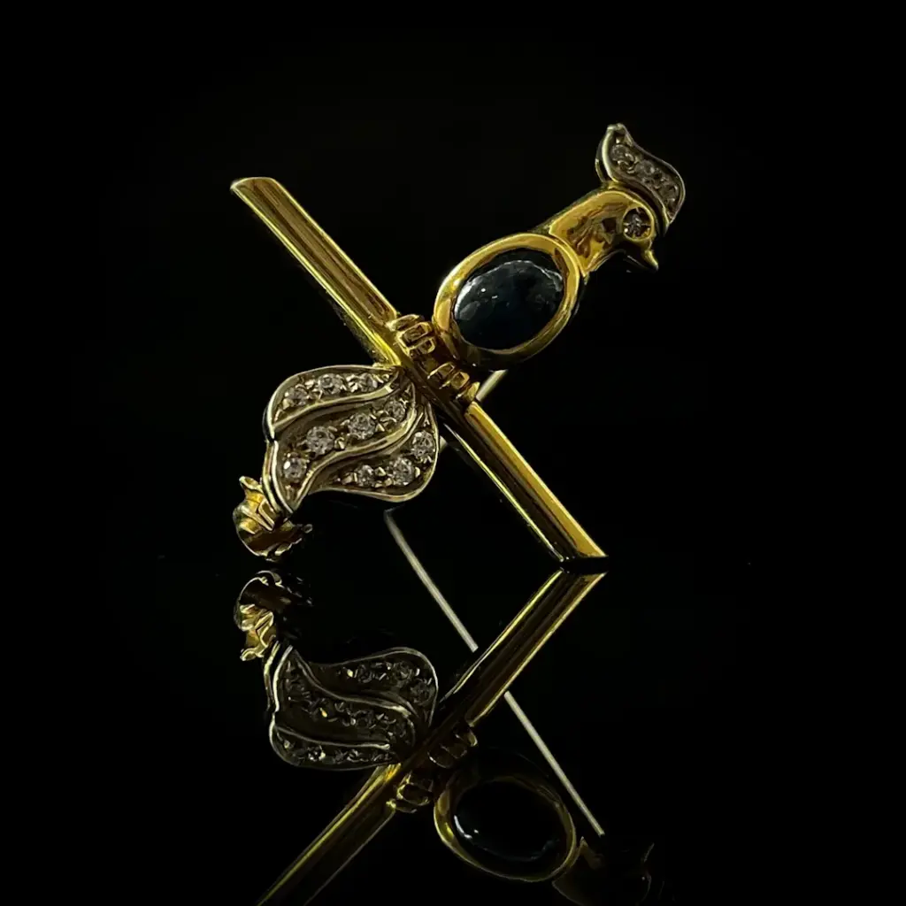 Broche oiseau saphir