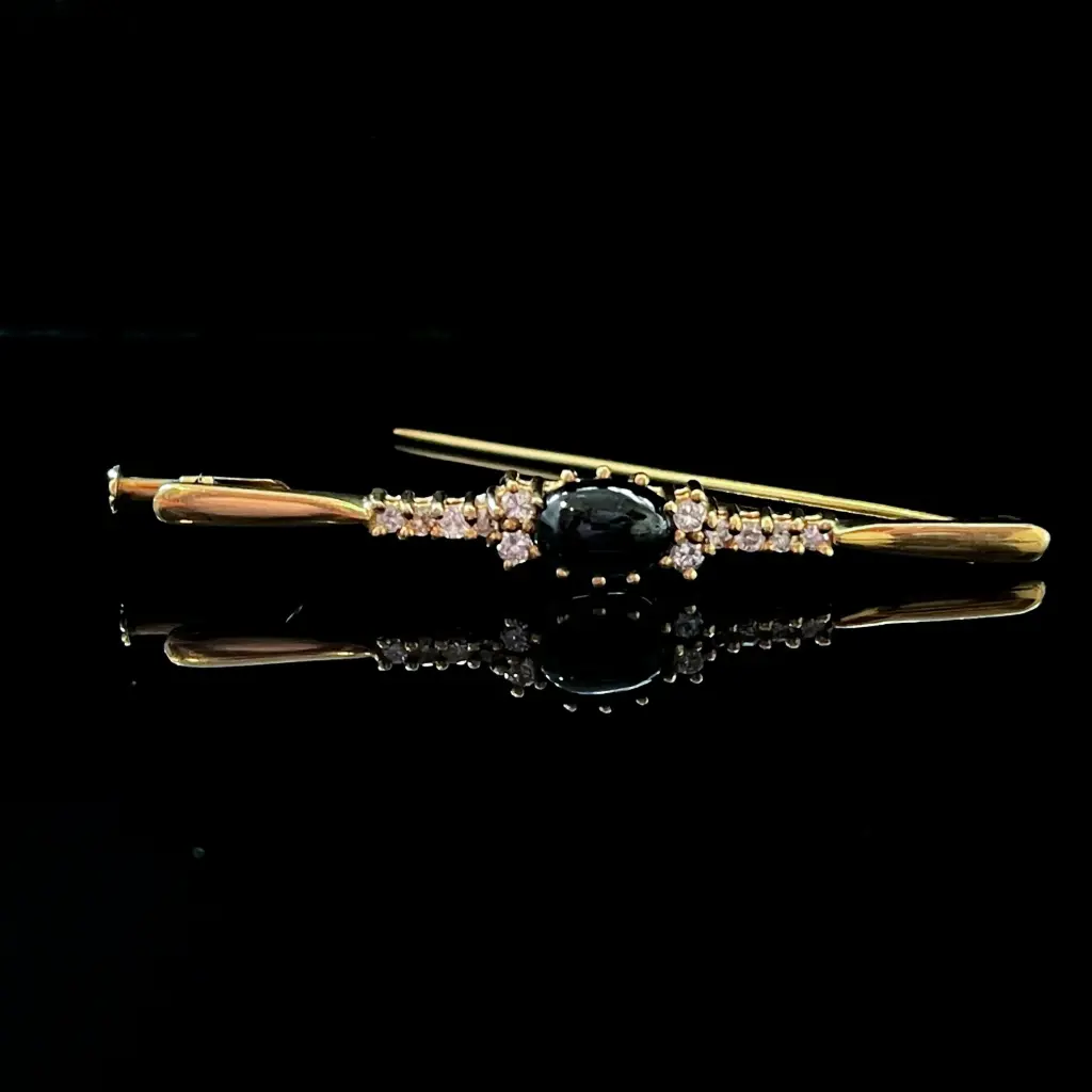 Broche topaze et brillants