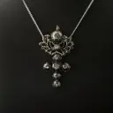 Pendentif croix flamande & diamants roses