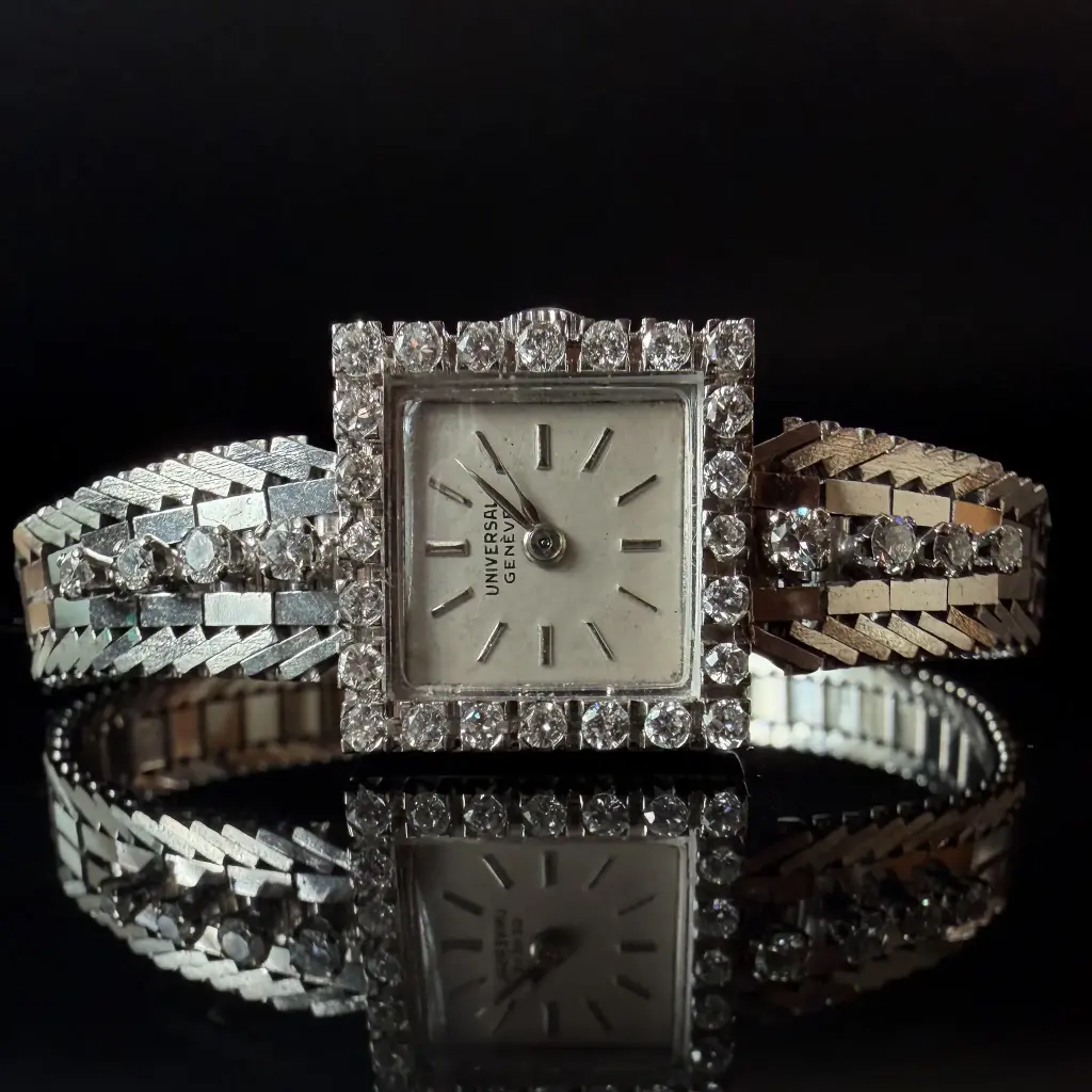 Universal Genève vintage or blanc 