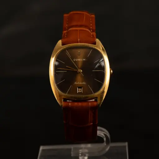 [Dio1] Montre Corum Or